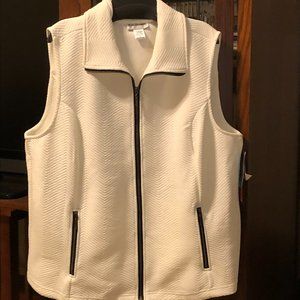 White sleeveless zip front vest